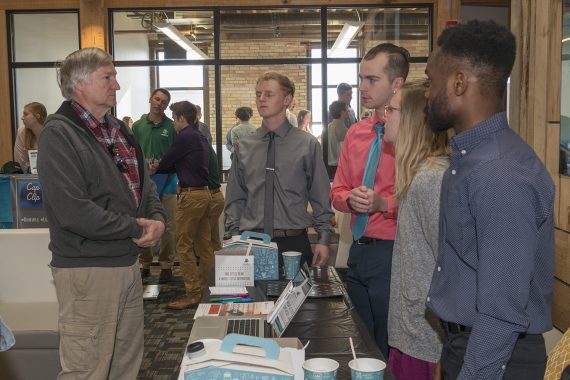 BSU Marketing Students Showcase Creativity at Mock Trade Show Bemidji State University marketing students presenting their original projects to local entrepreneurs.