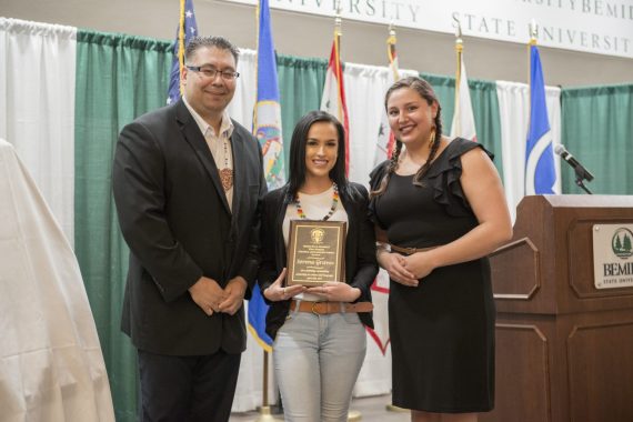 Student Serena Graves receiving the Earl Nyholm Culture and Language Award at the American Indian Resource Center Awards Banquet.