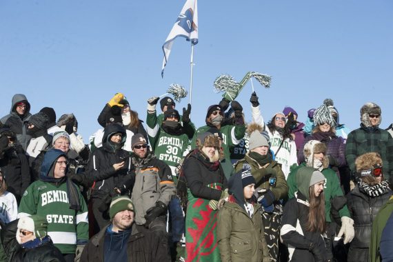 A crowd of fans at a hockey game during the Hockey Day Minnesota weekend.