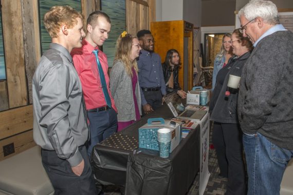 Marketing students present their ideas at an April mock trade show in downtown Bemidji