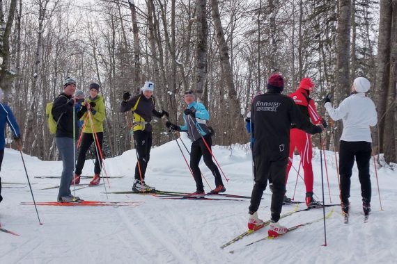 BSU alumni skiing.