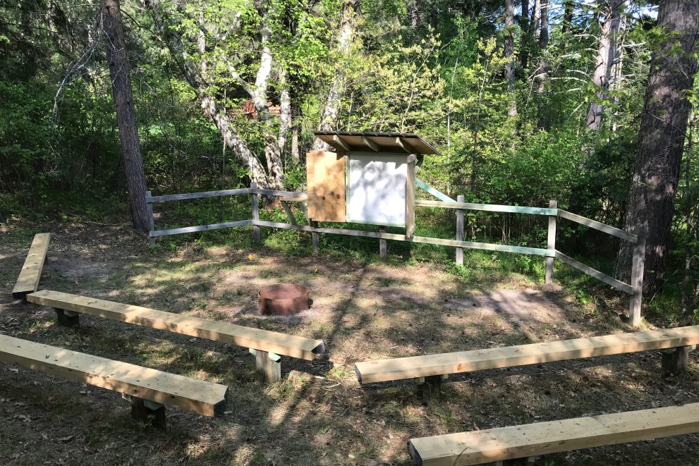 Hobson Memorial Forest renovated amphitheater and whiteboard.