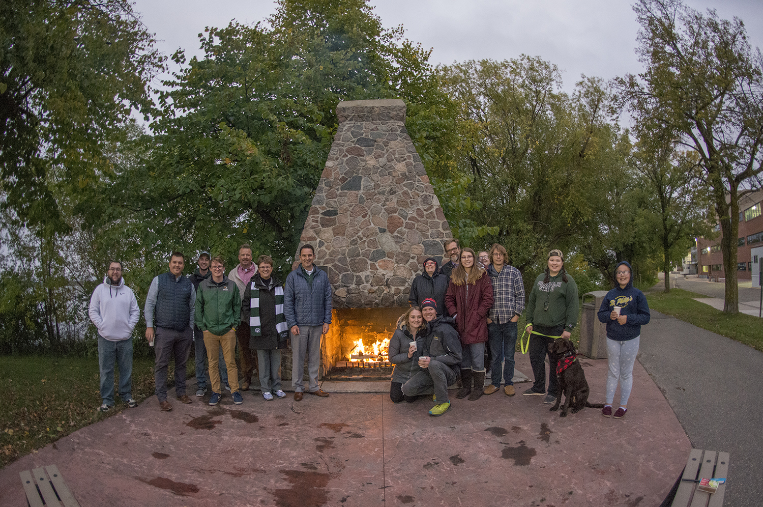 Friends and family of Bemidji State University gather around the first annual Homecoming Hearth.