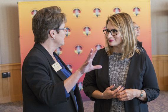 President Hensrud speaking with Lt. Governor Peggy Flanagan.
