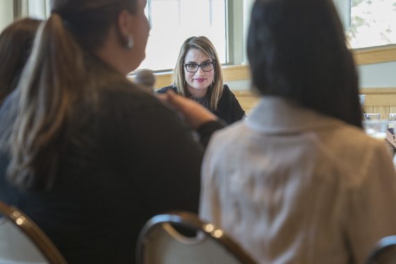 Flanagan talks with and hears from students.