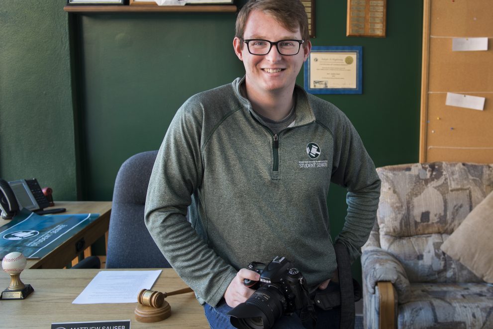 Matthew Sauser in the student senate office