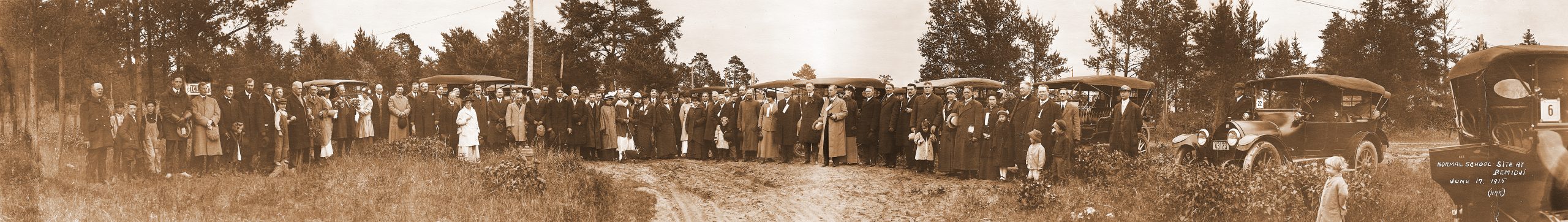 Bemidji citizens gather in 1915 on the donated ground where Bemidji Normal School will be constructed.