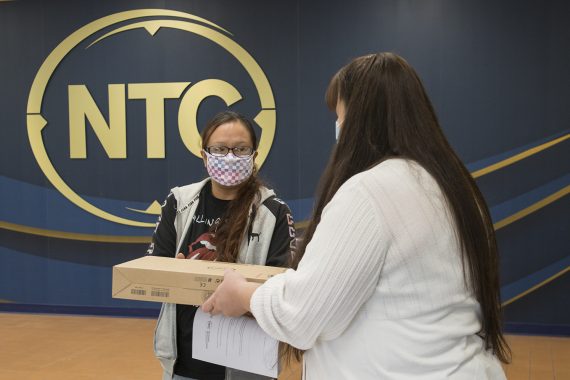 BSU and NTC Distribute Laptops to Students Awarded COVID-19 GEER Grants Chrissy Koch, executive director of the American Indian Resource Center, distributing Laptops to Students Awarded COVID-19 Relief Grants.