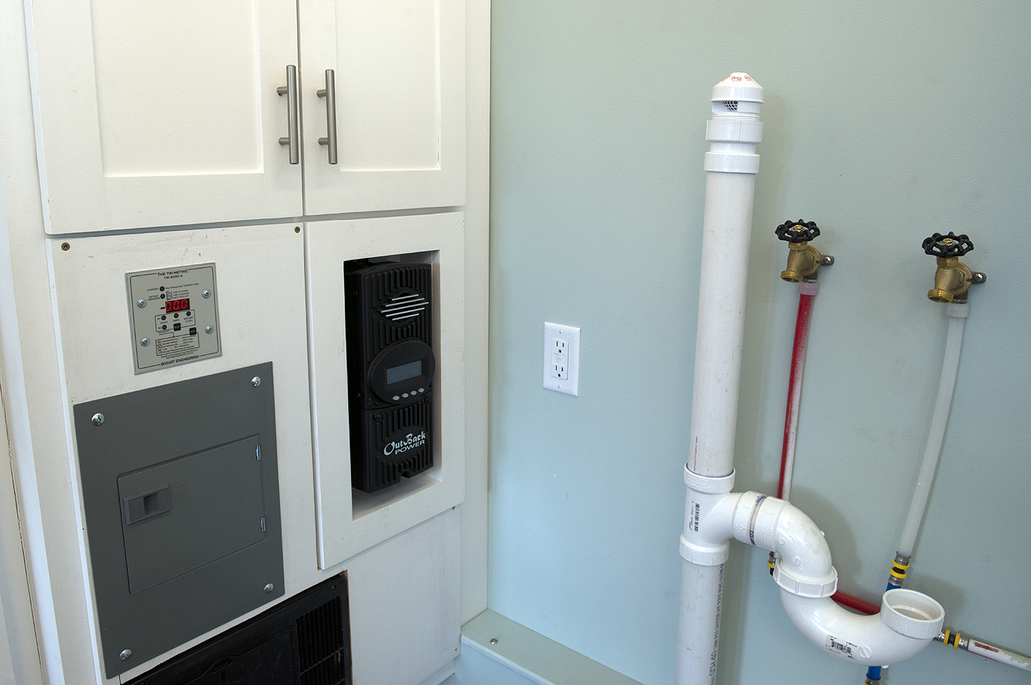 Bemidji State University tiny house Hookups for washer/dryer.