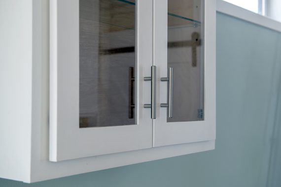 Bemidji State University tiny house Full-height kitchen cabinets.
