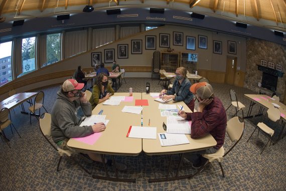 World cafe attendees discussing resiliency indicators