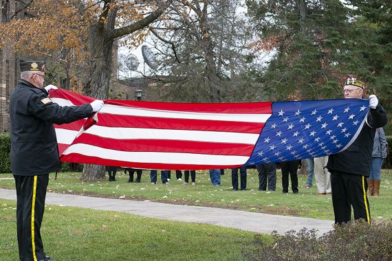 Presentation of colors and flag-raising ceremony at Bemidji State University’s flagpoles by Deputy Hall