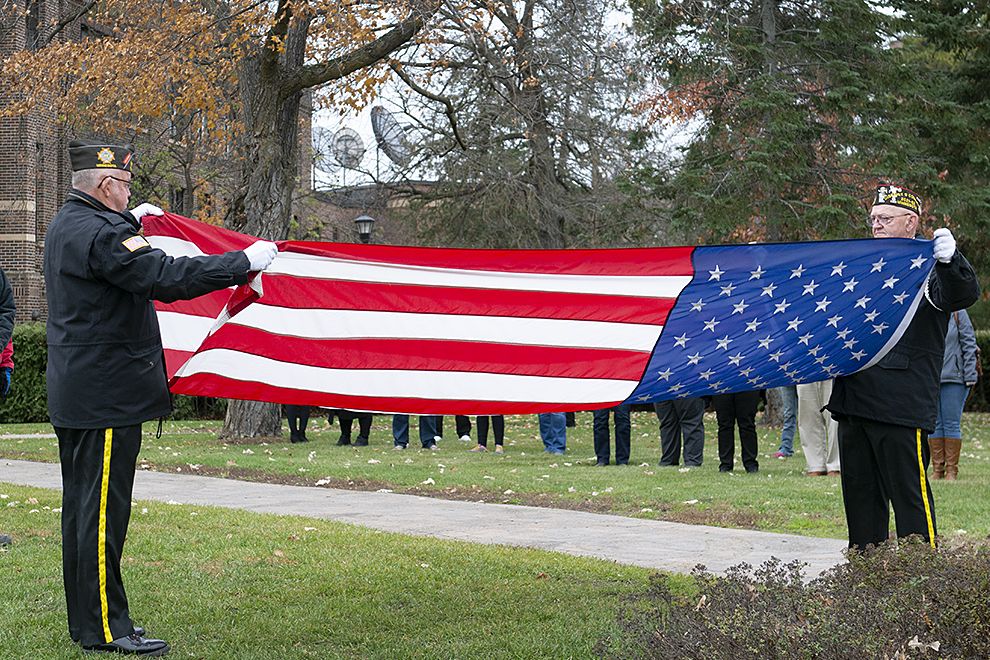 Presentation of colors and flag-raising ceremony at Bemidji State University’s flagpoles by Deputy Hall