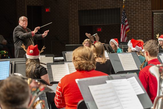 Scott Guidry, Bemidji State's director of bands and chair of the department of music, conducting the wind ensemble on the university's main stage.