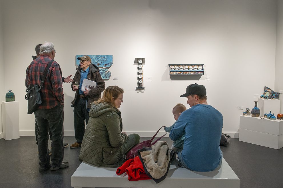 Attendees at Cyrus Swann's “Ambulations in Art” first friday opening