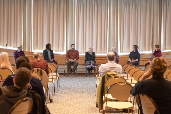 leaders from Bemidji State University and the community gathered in front of an audience in the American Indian Resource Center