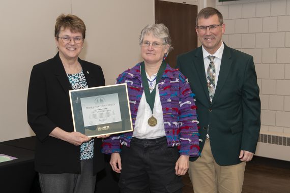 Dr. Co Livingston, professor of mathematics and computer science, presented with emeritus gifts.