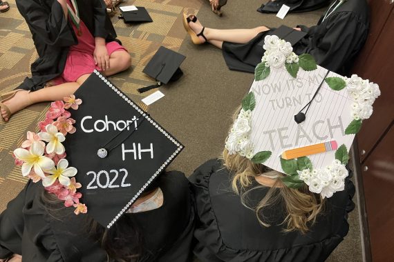 Bemidji State Class of 2022 graduation caps that say "Cohort HH 2022" and "Now it's my turn to teach"