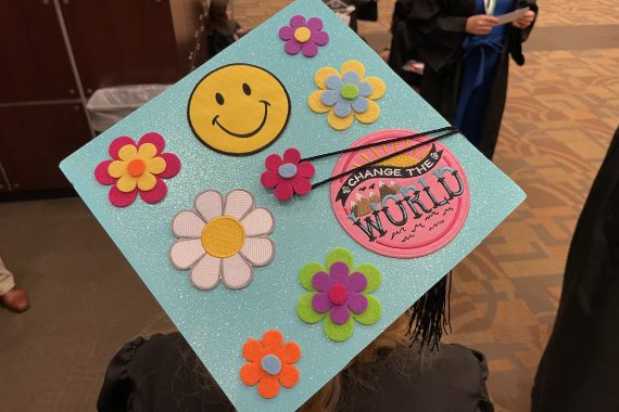 Bemidji State Class of 2022 graduation cap that says "Change the World"
