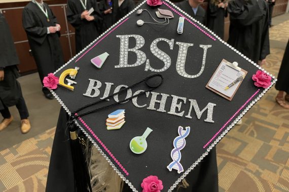 A graduation cap that says "'BSU Biochem"