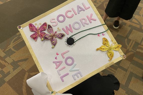 Bemidji State Class of 2022 graduation cap that says "Social Work Love all"