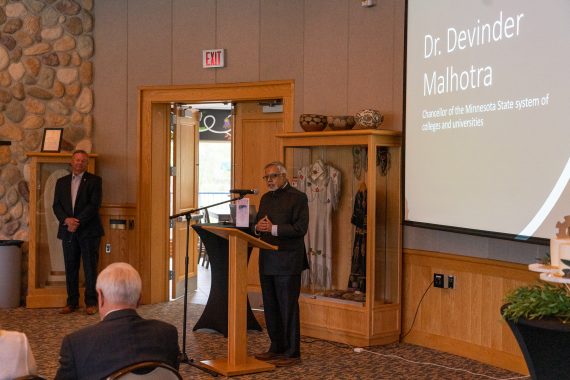 Chancellor Devinder Malhotra speaking at the retirement reception