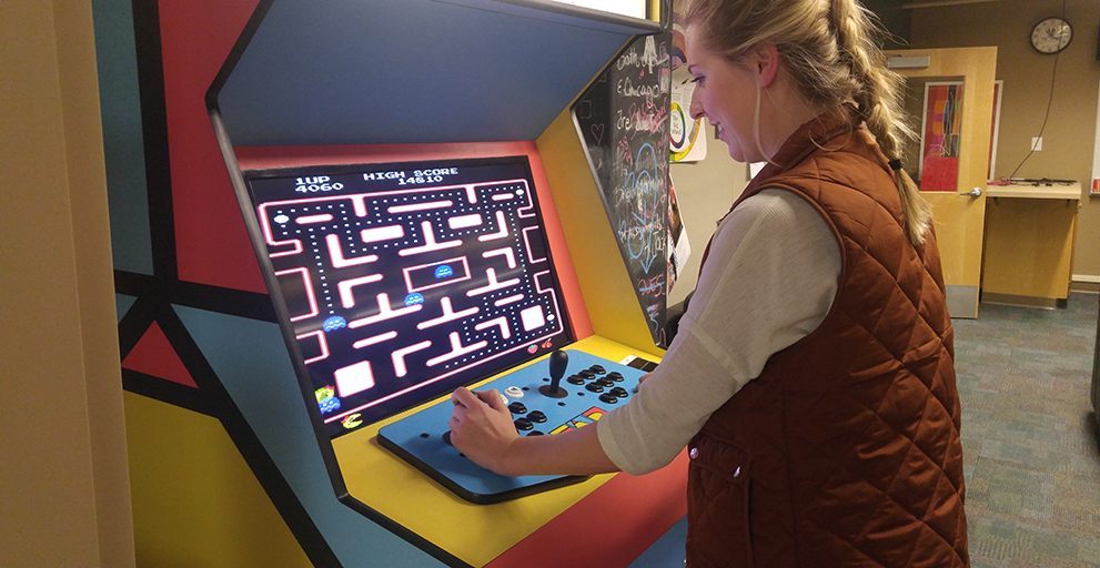 Student Playing Pac Man