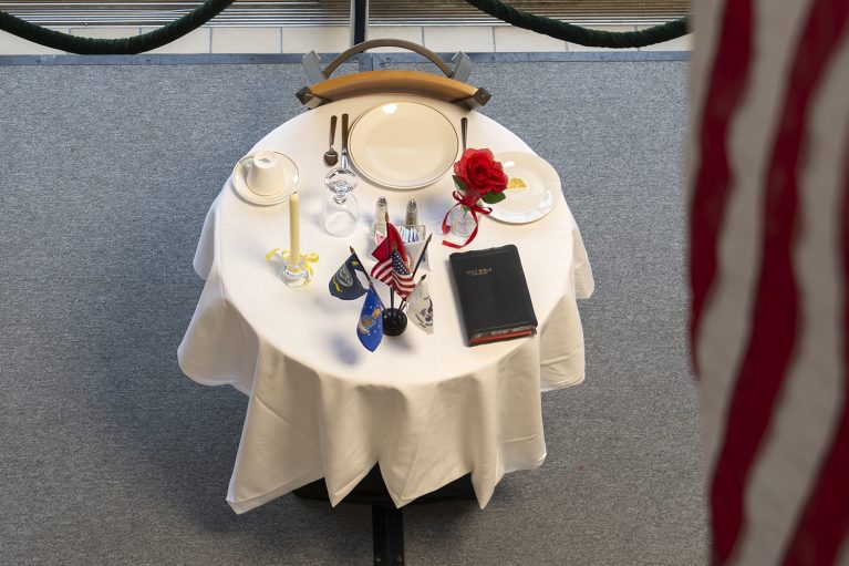 A missing man table displayed on the Bemidji State University campus honors the fallen, missing and imprisoned veterans,