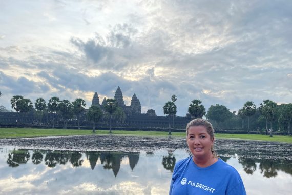 Dr. Kelly La Venture poses in front of the Angkor Wat in Cambodia