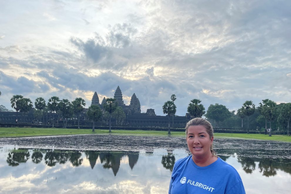 Dr. Kelly La Venture poses in front of the Angkor Wat in Cambodia