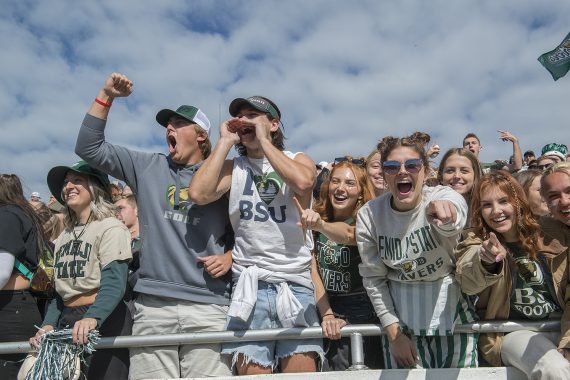 Bemidji State students cheering for the football team in the stands