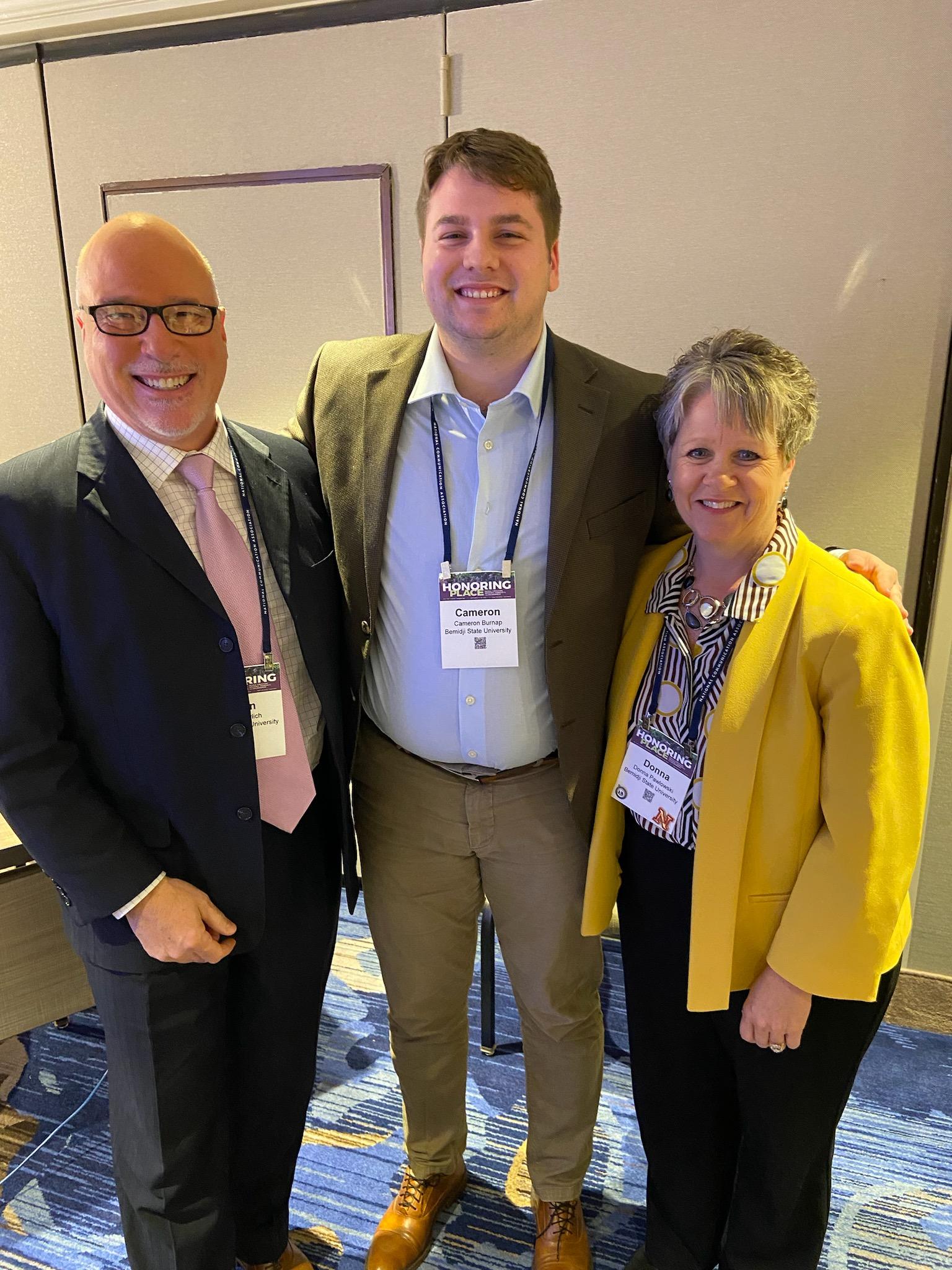 Dr. Donna Pawlowski (right) with Dr. John Perlich (L) and communication studies student Cameron Burnap