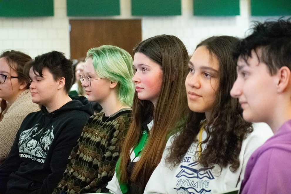 Seated students listen to a faculty member at BSU Sings! Day 2023