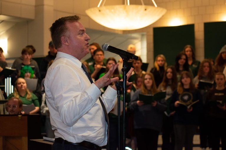 Dr. James Bowyer speaks to the audience at BSU Sings! Day 2023