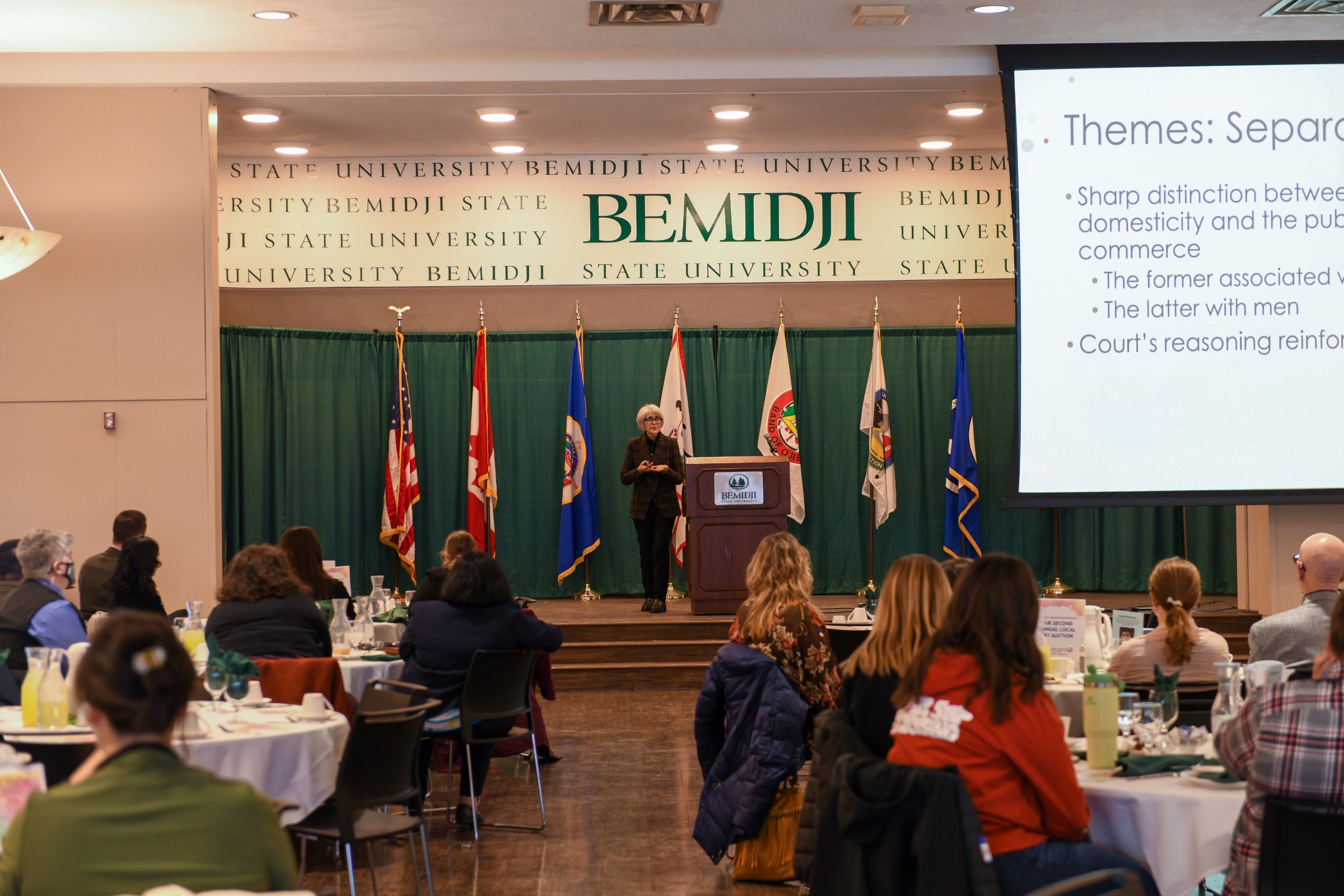 Dr. Maria Bevacqua, professor of gender and women's studies at Minnesota State University Mankato, speaks to attendees