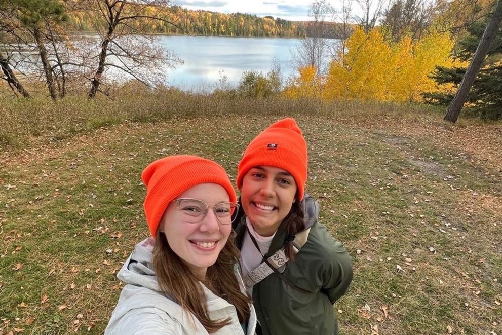 Author Lily and her friend pose for a photo