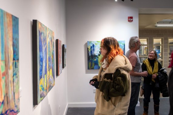 A BSU student looks at a painting on display in the Talley Gallery on April 4