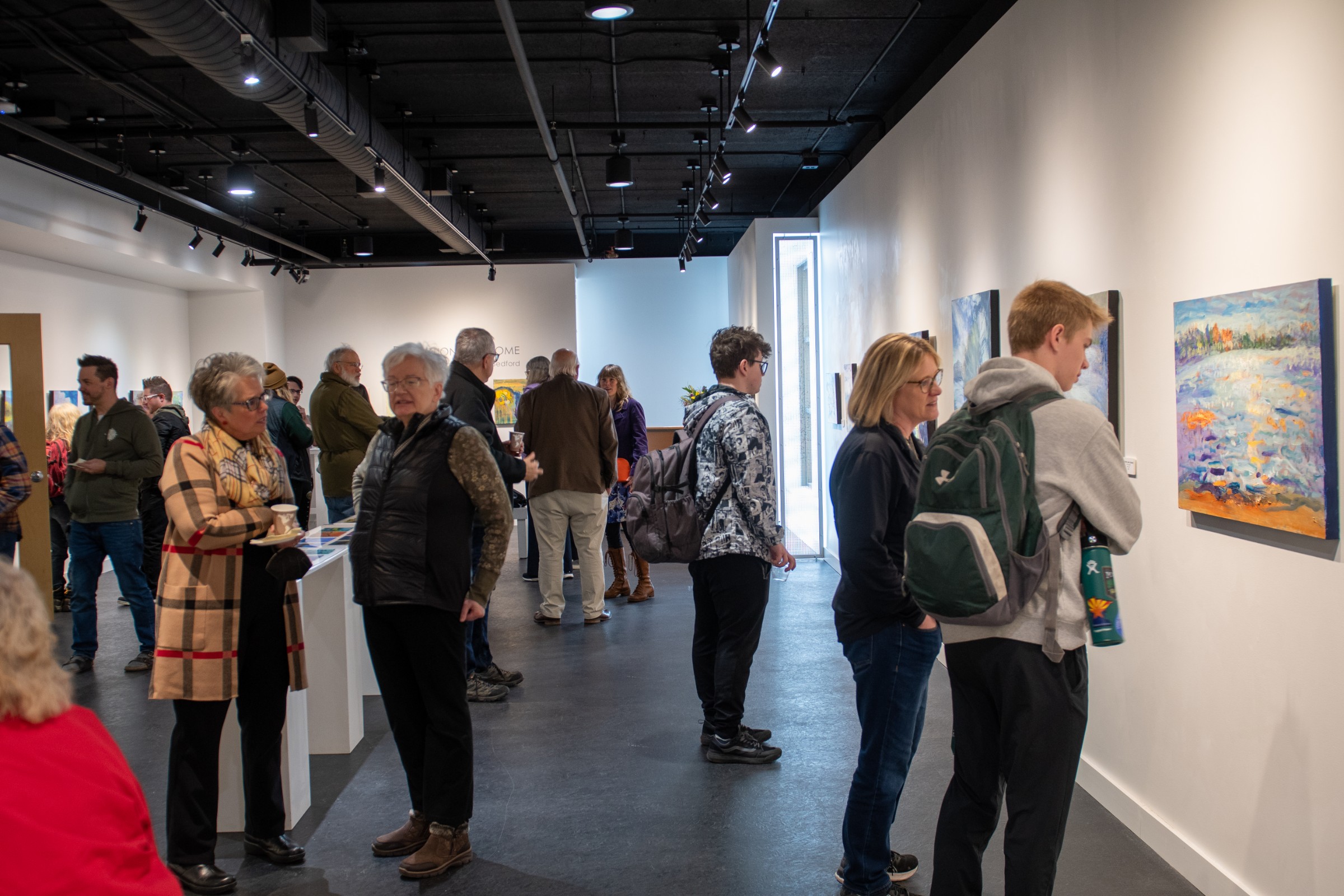 Attendees of the Talley Gallery opening reception on April 4