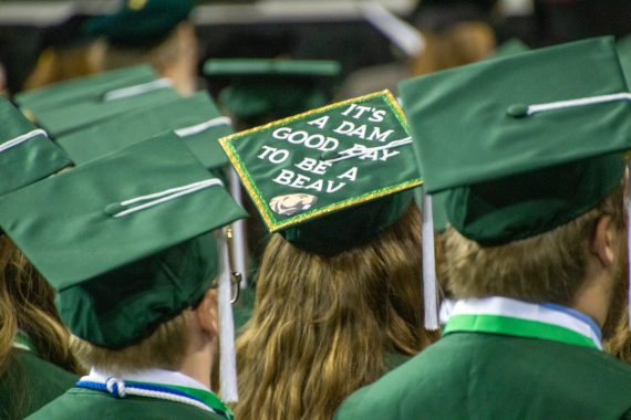 A photo of a graduation cap that reads "It's a dam good day to be a Beav."