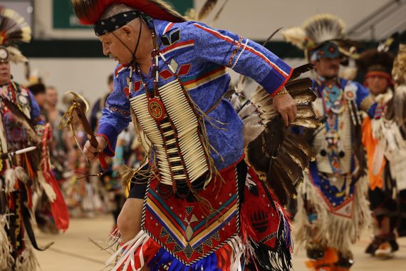 A photo of an American Indian dancer at the powwow