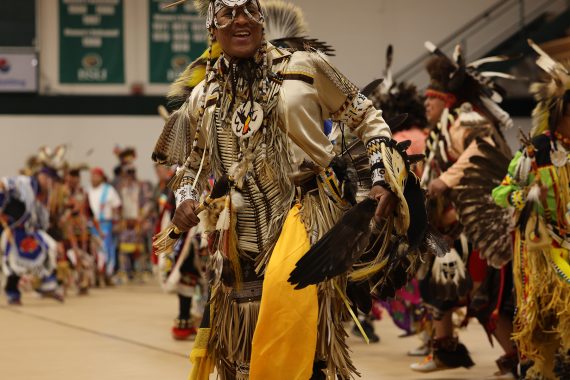 A photo of an American Indian dancer at the powwow