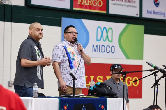 An announcer speaks during BSU's 50th Powwow