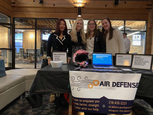 BSU students pose for a photo at marketing trade show