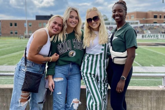 BSU students pose for a photo during a Beaver football game