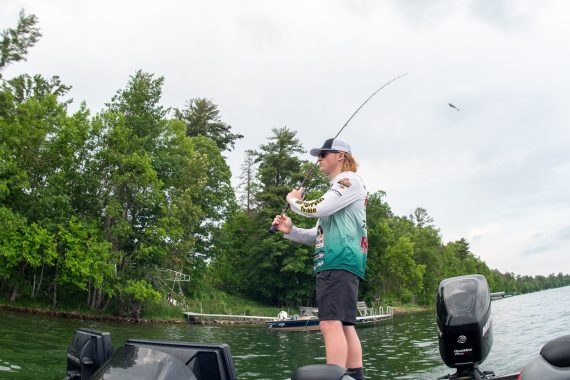 Nick Kolodziejski casts with his fishing rod