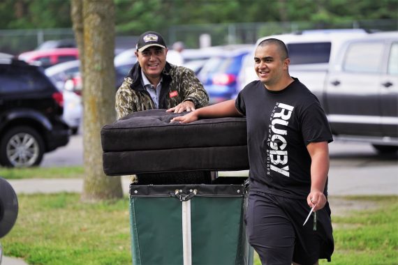 A student moves into their residence hall room at BSU