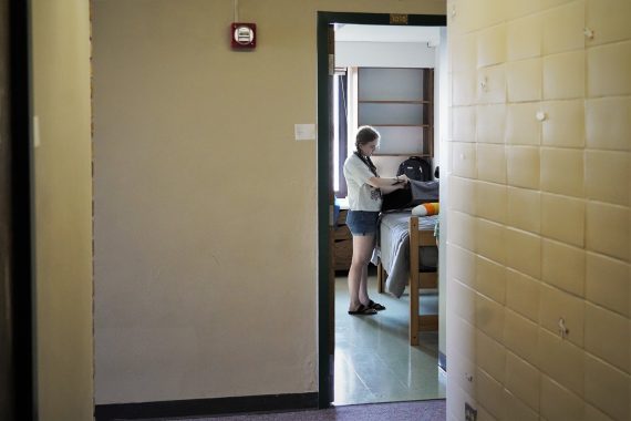 A student moves into their residence hall room at BSU