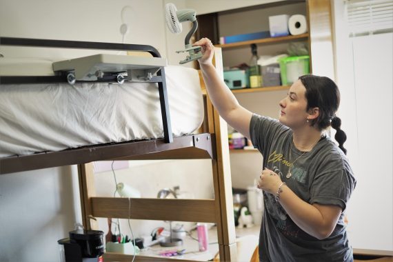 A student moves into their residence hall room at BSU