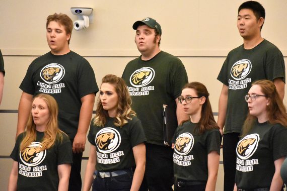 The Bemidji Choir warms up for its performance of BSU's Alma Mater.