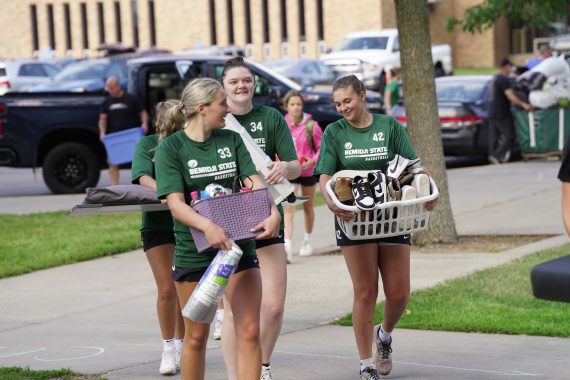 The BSU women's basketball team helps students move into their rooms